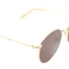Vista lateral del lente de sol Levis metal dorado forma redonda medida 52 21 145