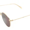 Vista diagonal del lente de sol Levis metal dorado forma redonda medida 52 21 145