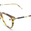 Vista diagonal del aro oftálmico Longchamp acetato café carey forma rectangular redondeado medida 53 15 140
