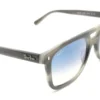 Vista lateral del lente de sol Ray Ban en color gris