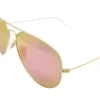 Vista diagonal del lente de sol Ray Ban Metal Dorado Filtro Azul Sol